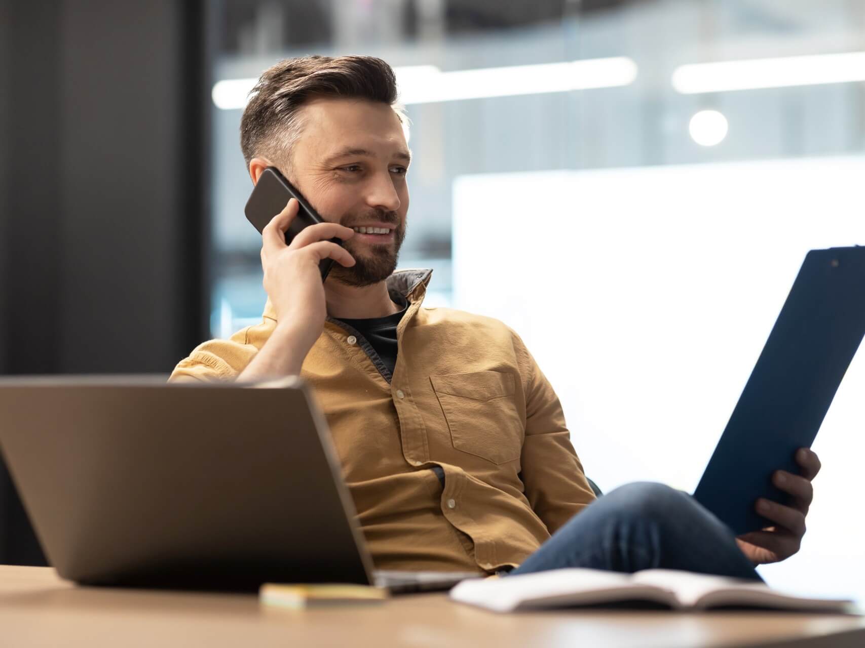 man on the phone with an it consulting business